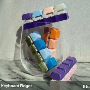 2000004005849-fidget-9-touches